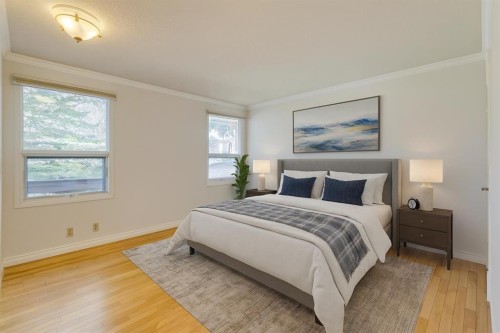 203 Edgeland Road Nw, Calgary, AB - Indoor Photo Showing Bedroom