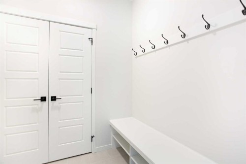 49 Creekside Passage Sw, Calgary, AB - Indoor Photo Showing Other Room