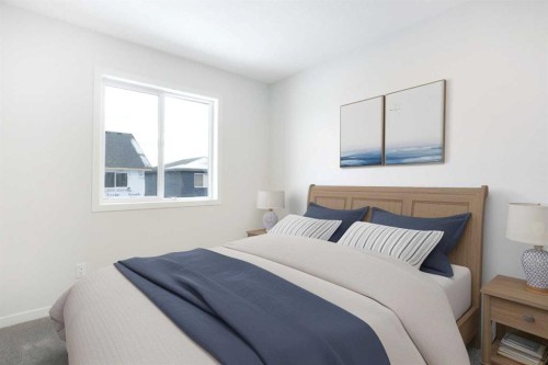 49 Creekside Passage Sw, Calgary, AB - Indoor Photo Showing Bedroom