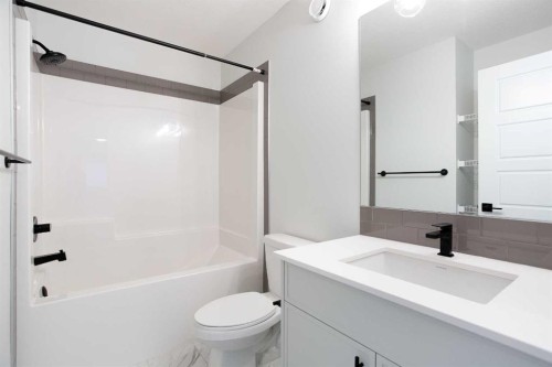 49 Creekside Passage Sw, Calgary, AB - Indoor Photo Showing Bathroom