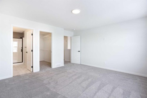 49 Creekside Passage Sw, Calgary, AB - Indoor Photo Showing Other Room