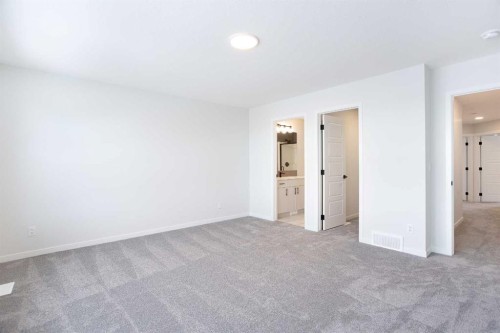 49 Creekside Passage Sw, Calgary, AB - Indoor Photo Showing Other Room