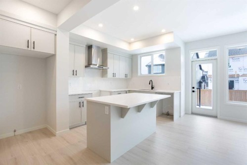 49 Creekside Passage Sw, Calgary, AB - Indoor Photo Showing Kitchen