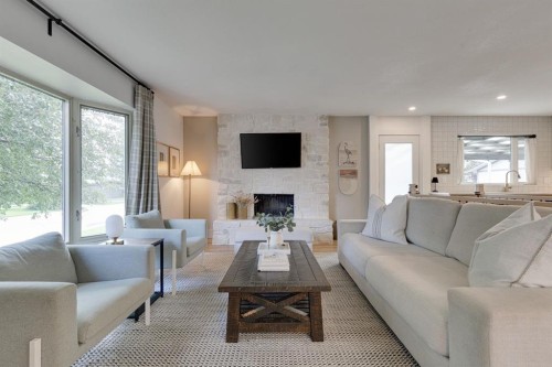 840 Archwood Road Se, Calgary, AB - Indoor Photo Showing Living Room With Fireplace