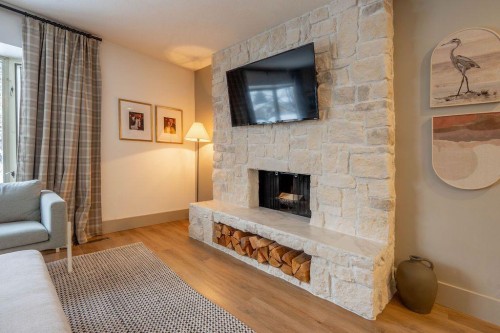 840 Archwood Road Se, Calgary, AB - Indoor Photo Showing Living Room With Fireplace
