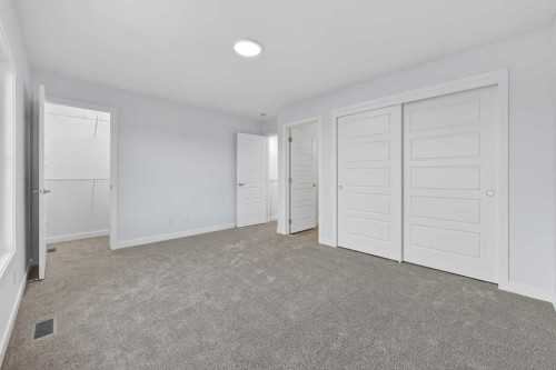 107-1750 Rangeview Drive Se, Calgary, AB - Indoor Photo Showing Other Room