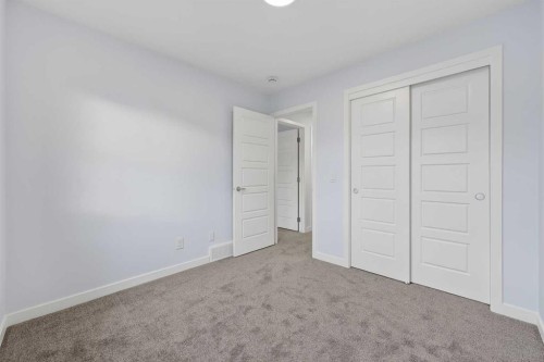 107-1750 Rangeview Drive Se, Calgary, AB - Indoor Photo Showing Other Room