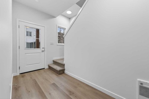 107-1750 Rangeview Drive Se, Calgary, AB - Indoor Photo Showing Other Room