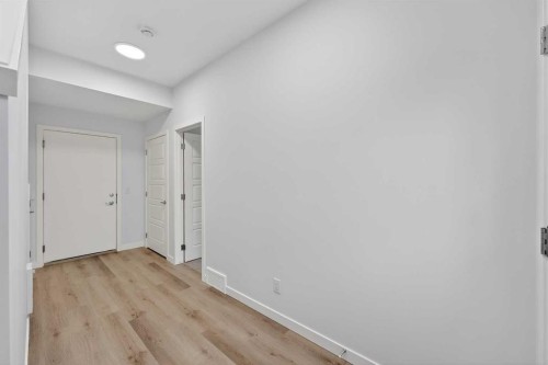 107-1750 Rangeview Drive Se, Calgary, AB - Indoor Photo Showing Other Room