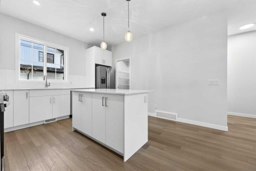 412-1750 Rangeview Drive Se, Calgary, AB - Indoor Photo Showing Kitchen