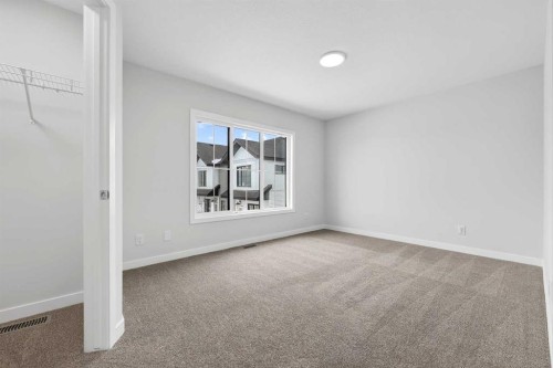 412-1750 Rangeview Drive Se, Calgary, AB - Indoor Photo Showing Other Room