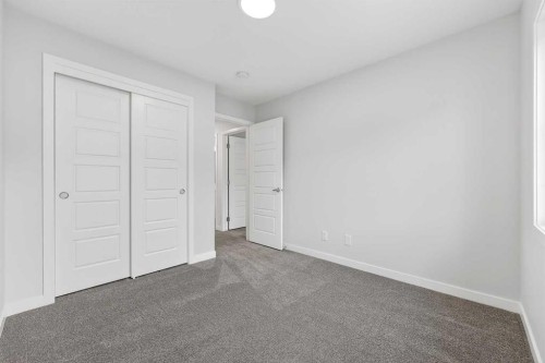 412-1750 Rangeview Drive Se, Calgary, AB - Indoor Photo Showing Other Room