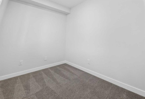 412-1750 Rangeview Drive Se, Calgary, AB - Indoor Photo Showing Other Room