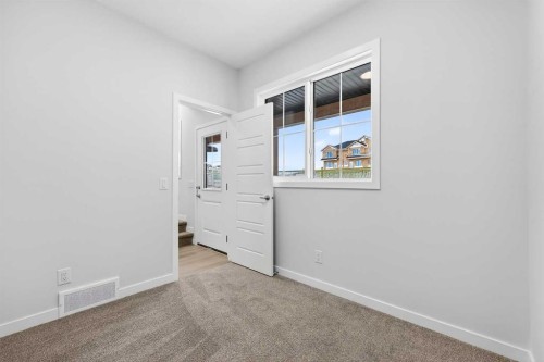 412-1750 Rangeview Drive Se, Calgary, AB - Indoor Photo Showing Other Room
