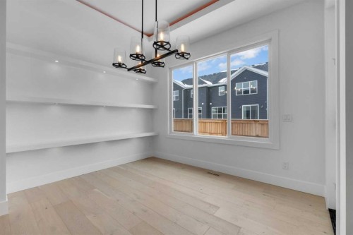 223 Kinniburgh Loop, Chestermere, AB - Indoor Photo Showing Other Room