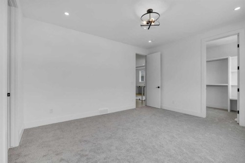 223 Kinniburgh Loop, Chestermere, AB - Indoor Photo Showing Other Room