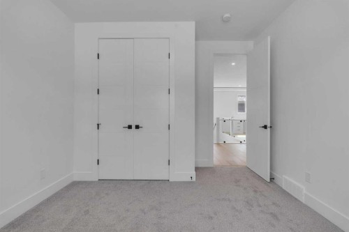 223 Kinniburgh Loop, Chestermere, AB - Indoor Photo Showing Other Room