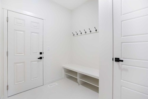 65 Creekside Passage Sw, Calgary, AB - Indoor Photo Showing Other Room