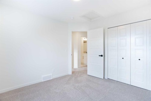 65 Creekside Passage Sw, Calgary, AB - Indoor Photo Showing Other Room