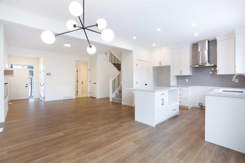 65 Creekside Passage Sw, Calgary, AB - Indoor Photo Showing Kitchen