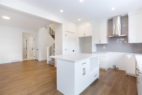 65 Creekside Passage Sw, Calgary, AB - Indoor Photo Showing Kitchen