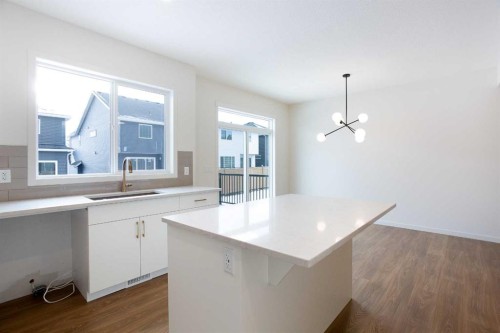 65 Creekside Passage Sw, Calgary, AB - Indoor Photo Showing Kitchen