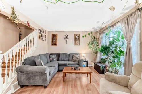 2319 56 Street Ne, Calgary, AB - Indoor Photo Showing Living Room