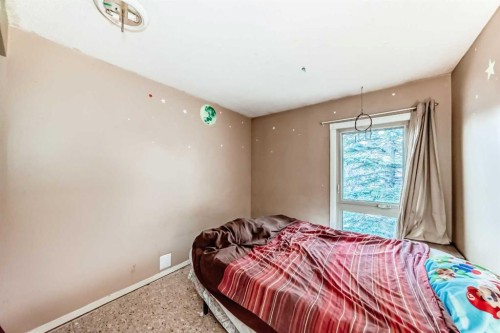 2319 56 Street Ne, Calgary, AB - Indoor Photo Showing Bedroom