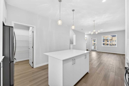 414-1750 Rangeview Drive Se, Calgary, AB - Indoor Photo Showing Kitchen With Upgraded Kitchen