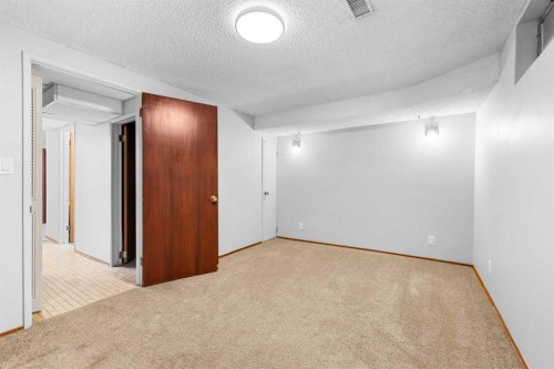 5116 Valiant Place Nw, Calgary, AB - Indoor Photo Showing Other Room