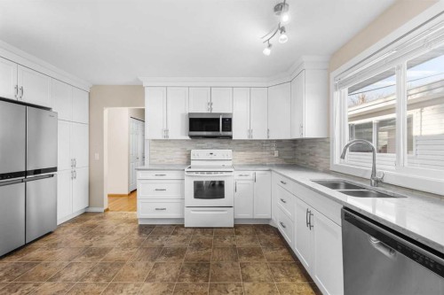 5116 Valiant Place Nw, Calgary, AB - Indoor Photo Showing Kitchen With Double Sink