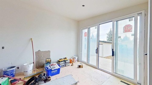 5616 Lodge Crescent Sw, Calgary, AB - Indoor Photo Showing Other Room