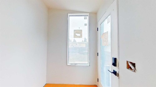 5616 Lodge Crescent Sw, Calgary, AB - Indoor Photo Showing Other Room