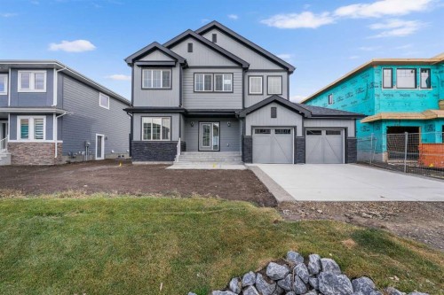 142 Sunstone Way, Balzac, AB - Outdoor With Facade