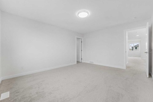 142 Sunstone Way, Balzac, AB - Indoor Photo Showing Other Room