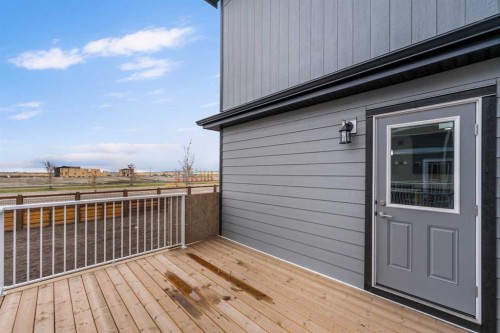 142 Sunstone Way, Balzac, AB - Outdoor With Exterior