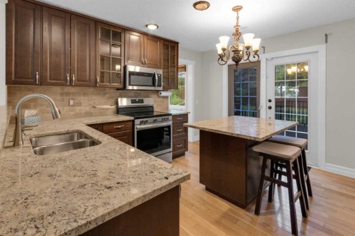 119 Cantrell Place Sw, Calgary, AB - Indoor Photo Showing Kitchen With Double Sink With Upgraded Kitchen