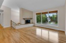 119 Cantrell Place Sw, Calgary, AB  - Indoor Photo Showing Living Room With Fireplace 