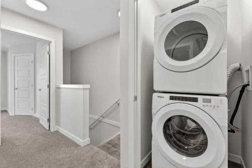 416-1750 Rangeview Drive Se, Calgary, AB - Indoor Photo Showing Laundry Room
