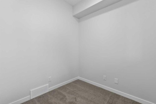 416-1750 Rangeview Drive Se, Calgary, AB - Indoor Photo Showing Other Room