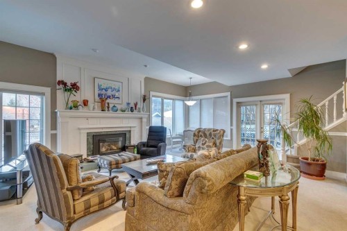 3028 1 Street Sw, Calgary, AB - Indoor Photo Showing Living Room With Fireplace