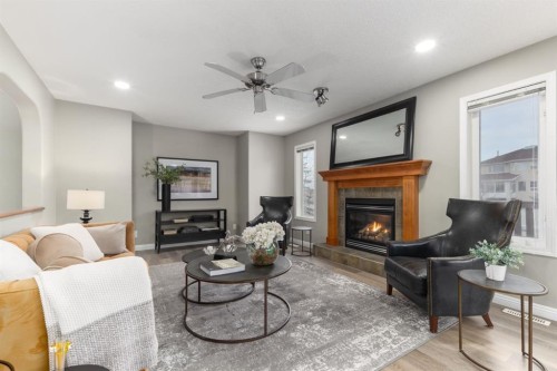 38 Simcoe Crescent Sw, Calgary, AB - Indoor Photo Showing Living Room With Fireplace