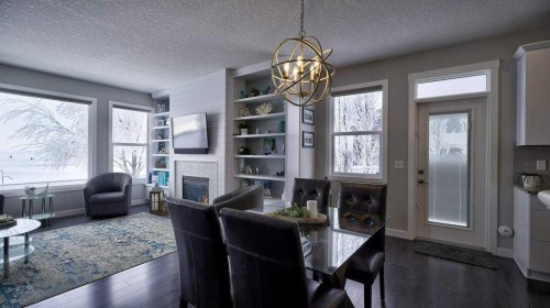 269 Boulder Creek Drive Se, Langdon, AB - Indoor With Fireplace