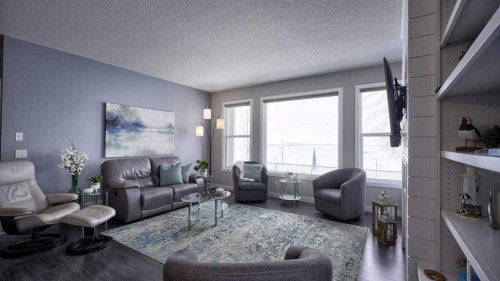 269 Boulder Creek Drive Se, Langdon, AB - Indoor Photo Showing Living Room