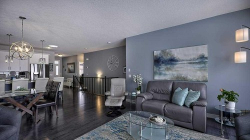 269 Boulder Creek Drive Se, Langdon, AB - Indoor Photo Showing Living Room