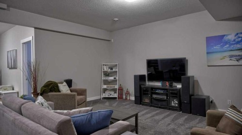 269 Boulder Creek Drive Se, Langdon, AB - Indoor Photo Showing Living Room