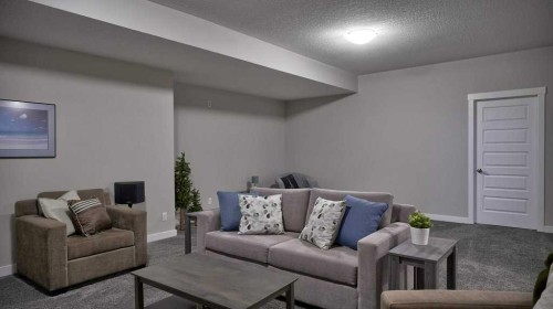 269 Boulder Creek Drive Se, Langdon, AB - Indoor Photo Showing Living Room