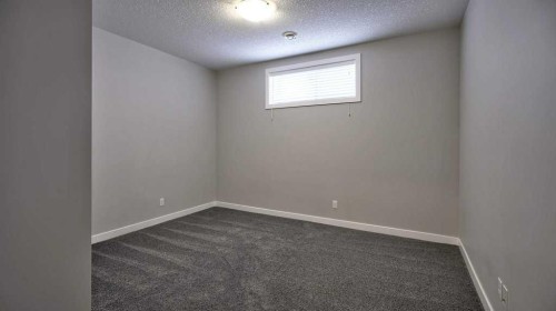 269 Boulder Creek Drive Se, Langdon, AB - Indoor Photo Showing Other Room