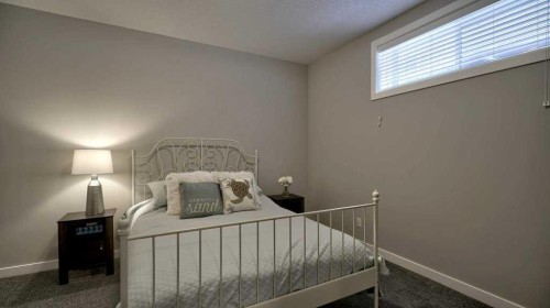 269 Boulder Creek Drive Se, Langdon, AB - Indoor Photo Showing Bedroom
