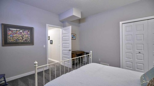 269 Boulder Creek Drive Se, Langdon, AB - Indoor Photo Showing Bedroom